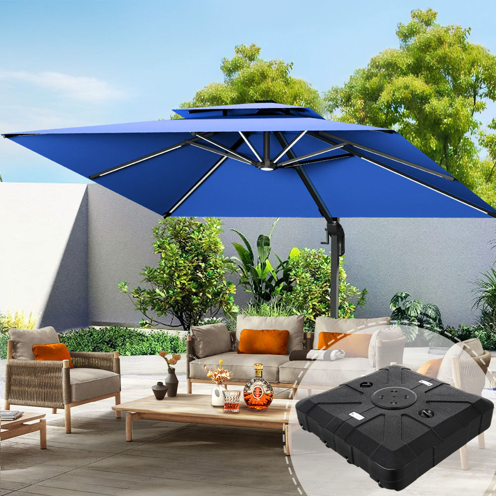 Patioslife 3×3m Navy Blue Aegis Premium cantilever umbrella with sturdy base highlighted, shading a backyard patio seating set with wicker furniture, wood table, leafy plants and a white garden wall