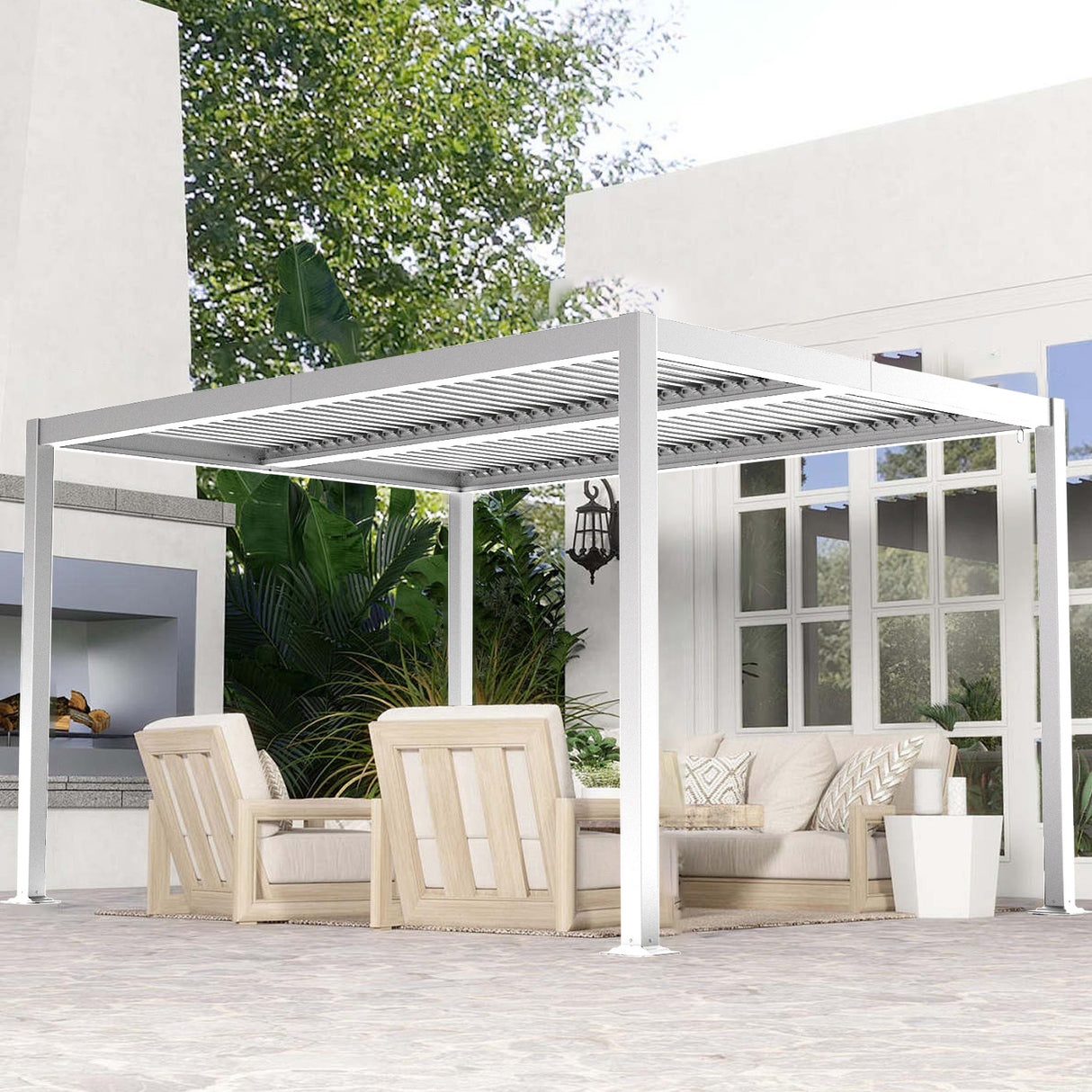 Patioslife 3 x 4m white aluminium louvered pergola over a bright courtyard lounge with modern outdoor furniture