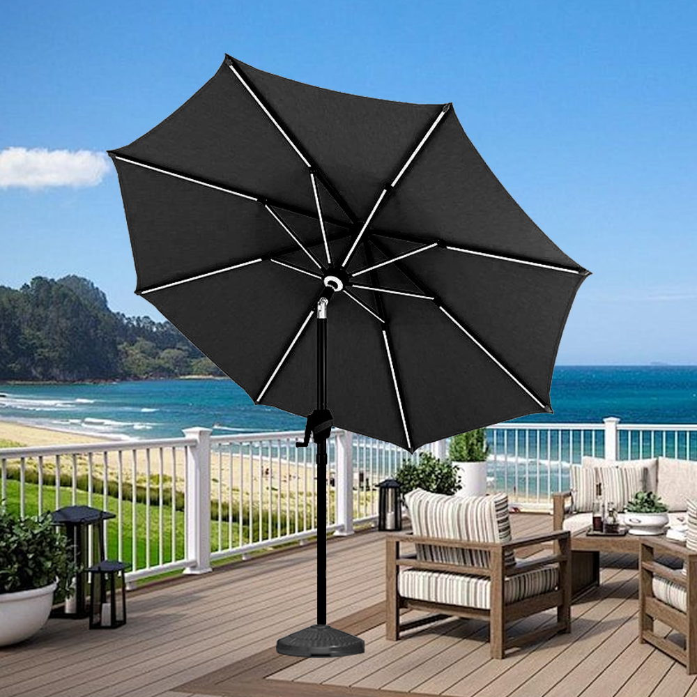 Patioslife Solara black market umbrella on a coastal deck with ocean view and outdoor lounge seating