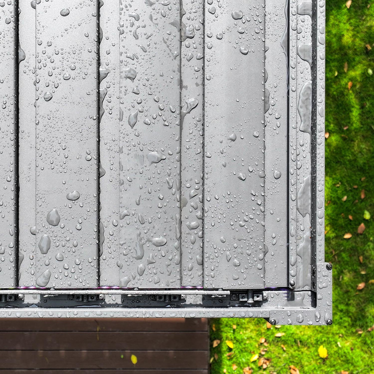 Close-up of Patioslife aluminium pergola adjustable louvers with water droplets showing weather-resistant waterproof performance