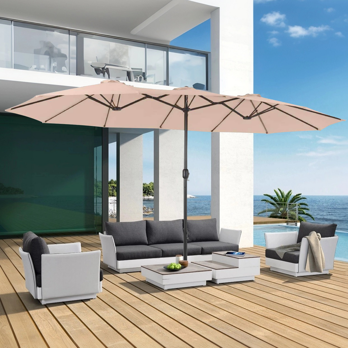 Patioslife Horizon Haven double-sided patio umbrella with base in tan, 4.6 x 2.7m, beside a pool with loungers and countryside views