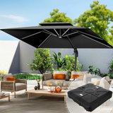 Patioslife 3×3m Black Aegis Premium cantilever umbrella with sturdy base highlighted in the foreground, shading a wicker patio sofa set in a sunny backyard with green trees and a white garden wall