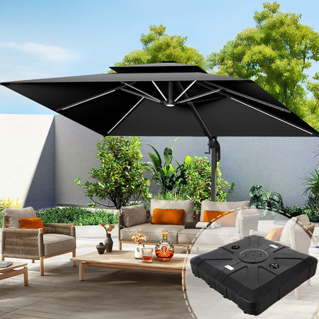 Patioslife 3×3m Black Aegis Premium cantilever umbrella with sturdy base highlighted in the foreground, shading a wicker patio sofa set in a sunny backyard with green trees and a white garden wall