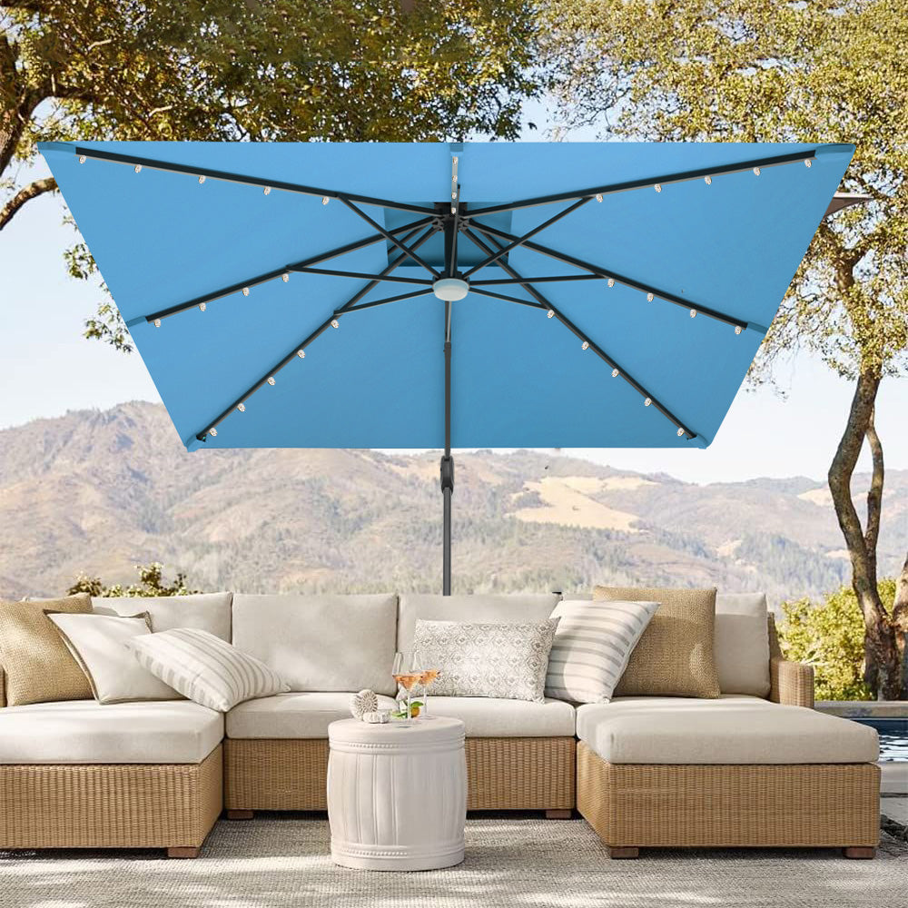 Patioslife 3x3m Turquoise LED cantilever umbrella over outdoor sofa with mountain garden view