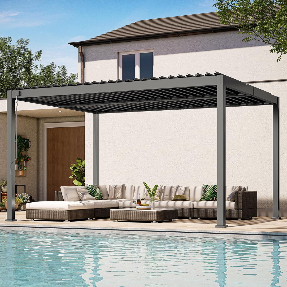 Patioslife 3 x 4m charcoal heavy-duty aluminium louvered pergola over a poolside sofa lounge beside a modern home