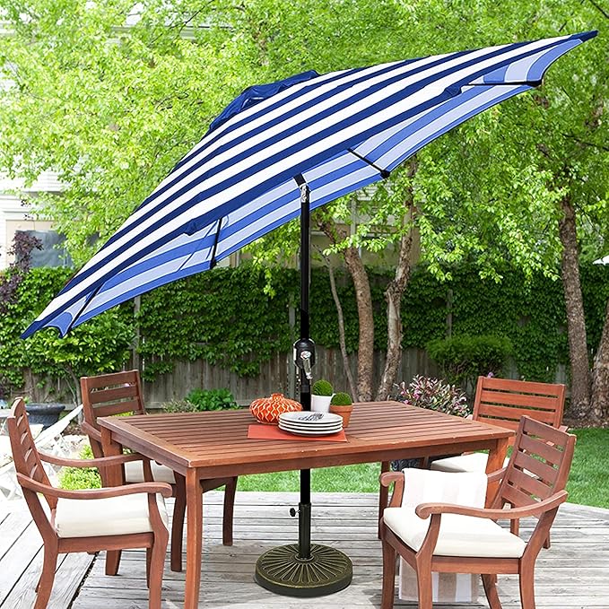 Patioslife Market Breeze blue and white striped outdoor umbrella over patio dining table