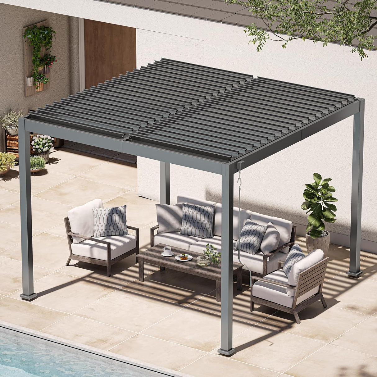 Patioslife 3 x 3m charcoal aluminium pergola with adjustable louvers over outdoor lounge seating beside a house and pool