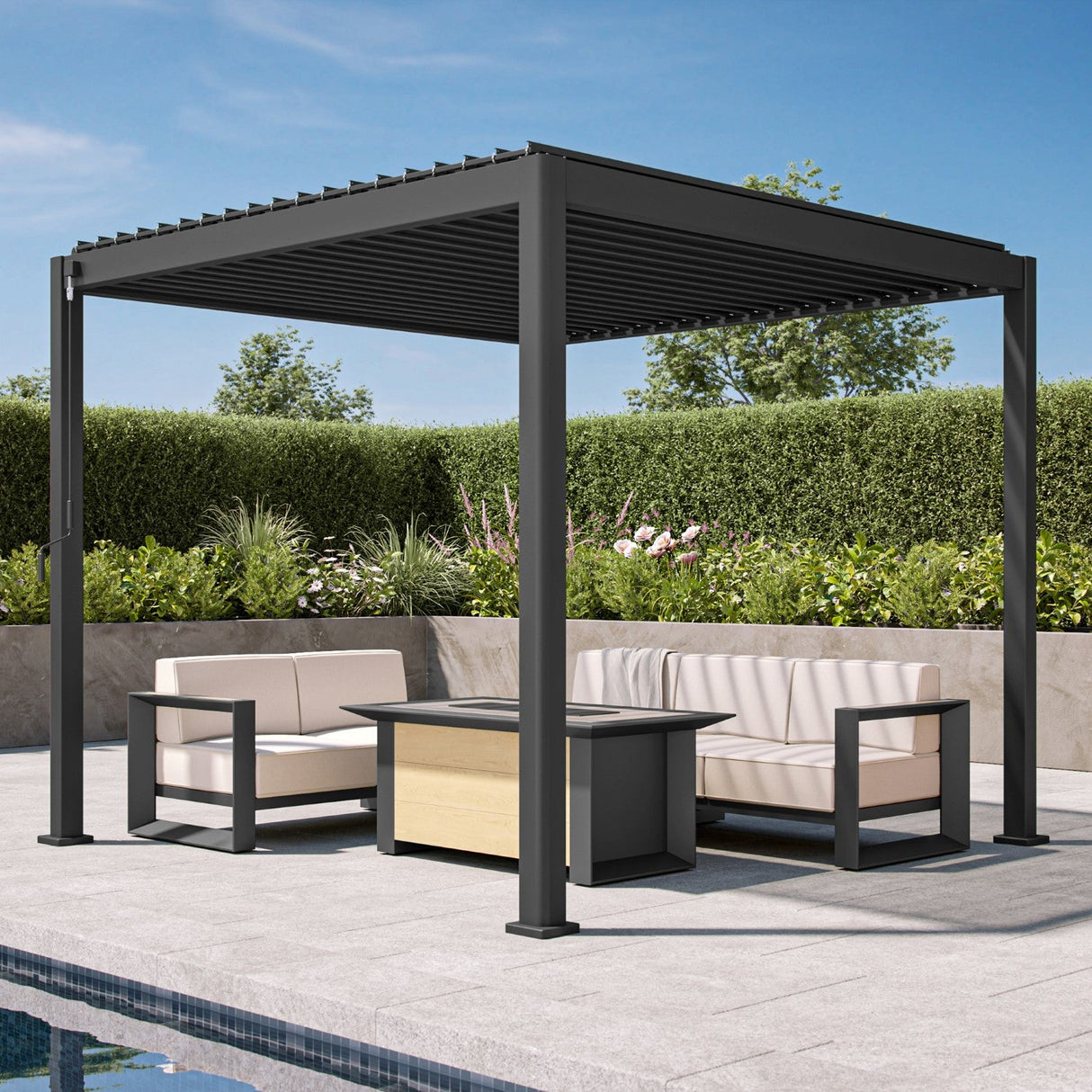 Patioslife 3 x 3m charcoal aluminium pergola with adjustable louvers over a modern poolside sofa set on a patio