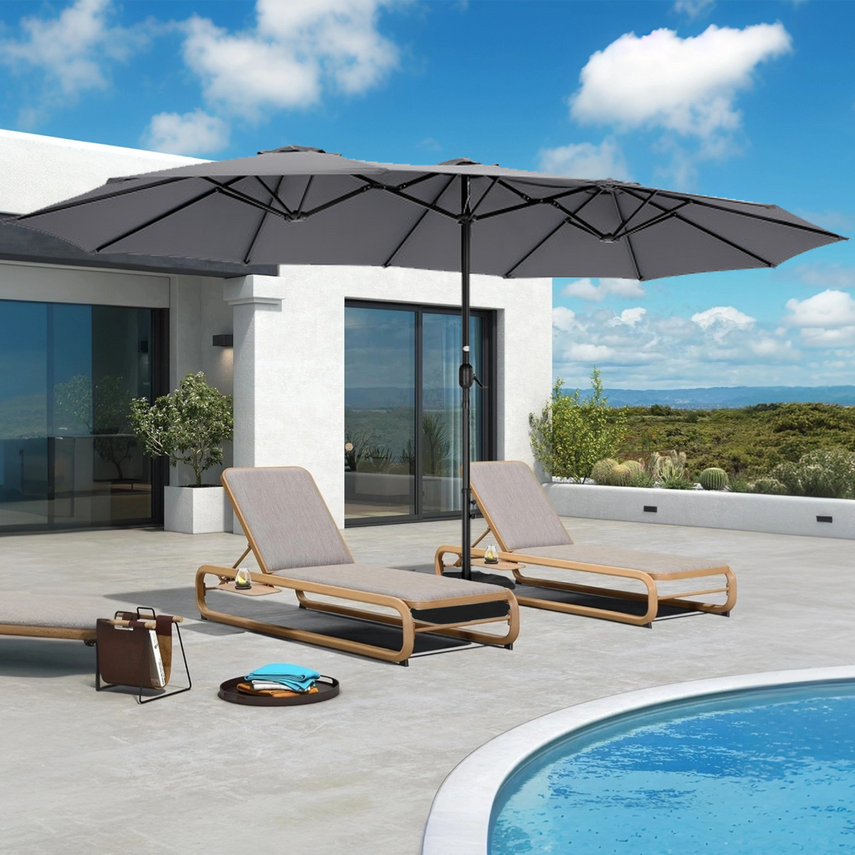 Patioslife Horizon Haven double-sided patio umbrella with base in grey, 4.6 x 2.7m, shading two chaise lounges by a curved pool
