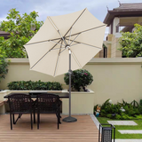 Patioslife Solara cream market umbrella shading a garden patio table and chairs in a residential backyard