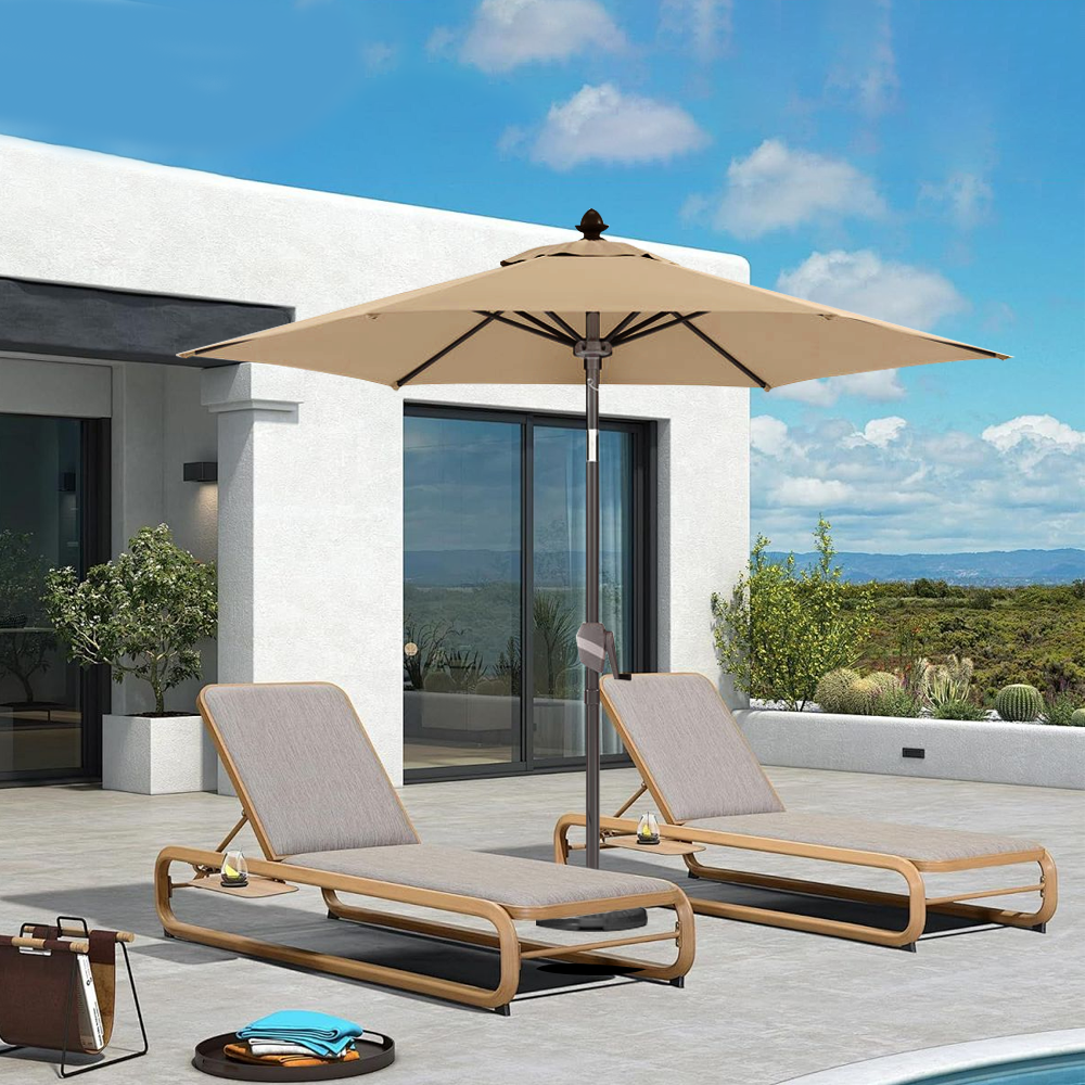 Patioslife Solara cream market umbrella shading two loungers on a modern villa patio with open sky view