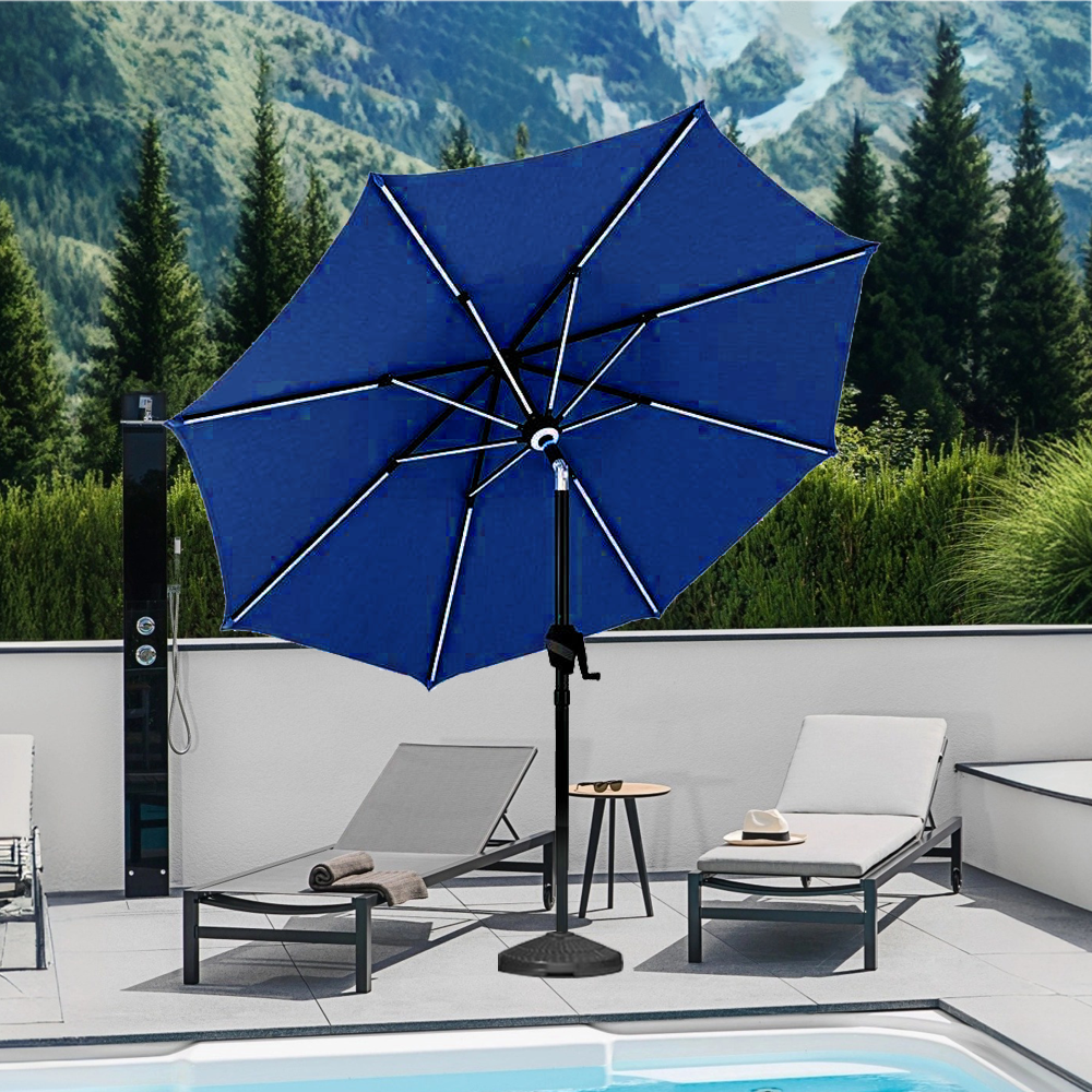 Patioslife Solara navy blue market umbrella shading poolside loungers on a mountain view terrace