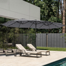 Patioslife Horizon Haven double-sided patio umbrella with base in gery, 4.6 x 2.7m,with LED lights beside pool loungers in a modern backyard
