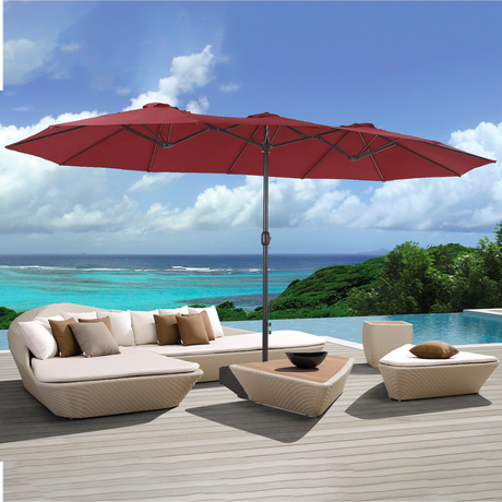 Patioslife Horizon Haven double-sided patio umbrella with base in red, 4.6 x 2.7m, shading a wicker outdoor lounge set beside an infinity pool and ocean view