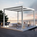Patioslife 3 x 3m white aluminium pergola with adjustable louvers over a luxury outdoor lounge on a seaside deck at sunset
